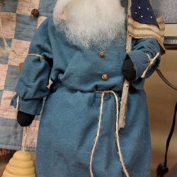 Blue coat with flag and bee skep